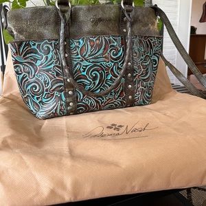 Beautiful Patricia Nash tooled leather bag.
